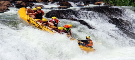 A picture of tourists White water rafting on the Nile